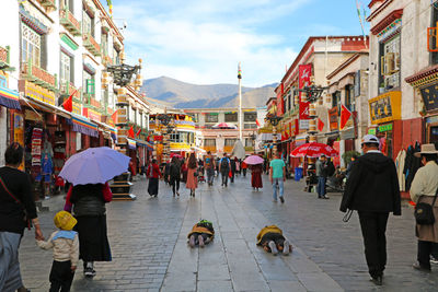 People praying in lhasa in the barkhor area