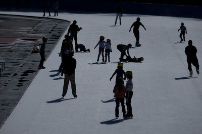 High angle view of people on snow