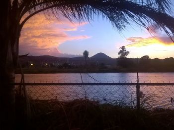 Scenic view of lake during sunset