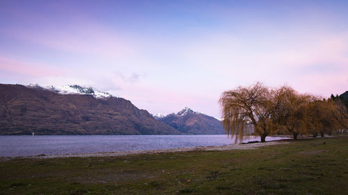 Scenic view of landscape against sky during sunset