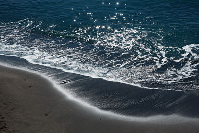 High angle view of sea and a beach