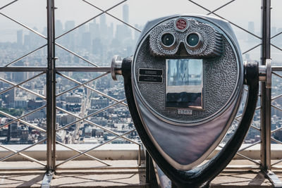 Binoculars on the observation platform at empire state building, new york city, usa.