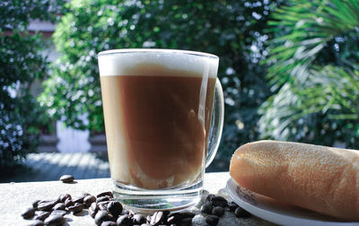 Close-up of coffee cup on table