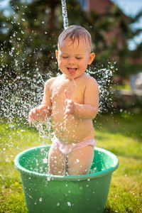 Boy playing in water