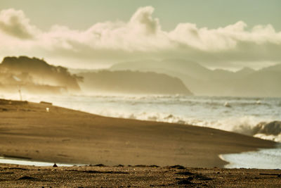 Scenic view of sea against sky during sunrise