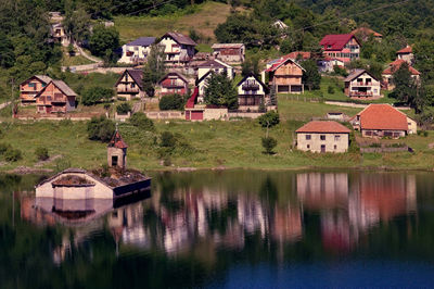 Houses in lake  the holly church in middle of the lake 