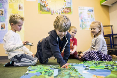 Elementary students playing in kindergarten