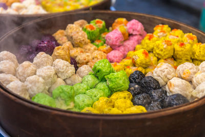 High angle view of candies in container