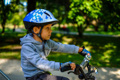 Boy riding bicycle