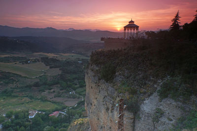 High angle view of buildings against sky during sunset