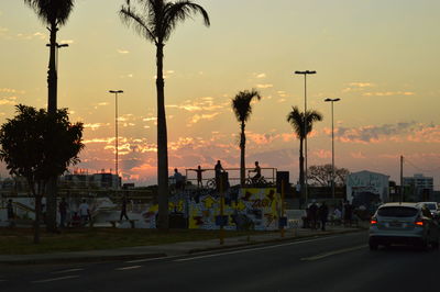 View of city against sky at sunset