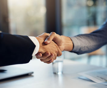 Close-up of business colleagues shaking hands