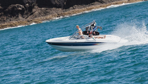 Boat sailing in sea