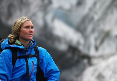 Portrait of young woman at hrafntinnusker glacier in iceland