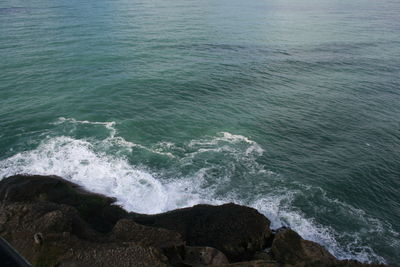 Waves splashing on rocks