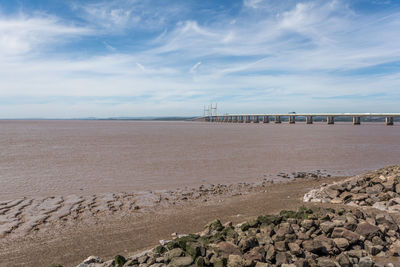 Second severn crossing over river against sky