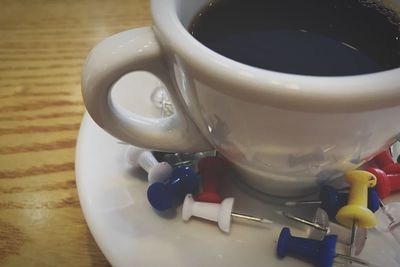 Close-up of coffee cup on table