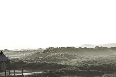 Scenic view of mountains against clear sky