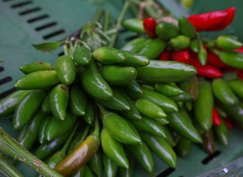 High angle view of chili peppers at market stall