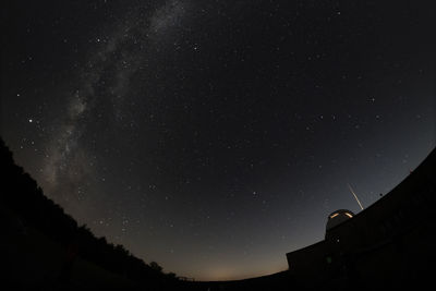 Low angle view of stars against sky at night