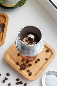 High angle view of coffee cup on table