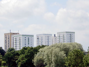 Buildings in city against sky
