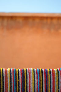 Colorful stripey towel hanging to dry at a riad in marrakech morocco