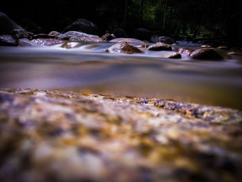 Surface level of water flowing through rocks