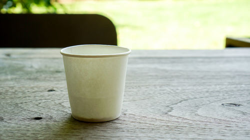 Close-up of coffee cup on table