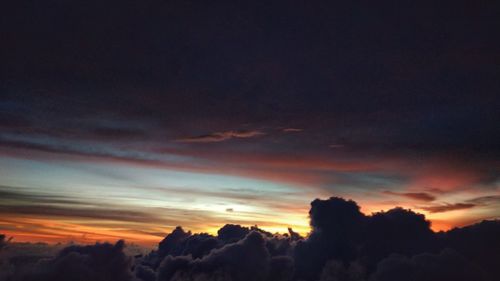 Low angle view of dramatic sky during sunset