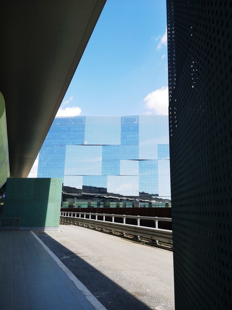 MODERN BUILDINGS IN CITY AGAINST SKY