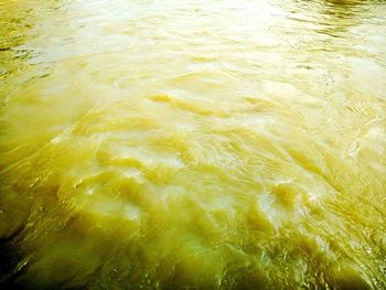 Full frame shot of yellow water