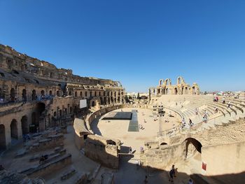 Panoramic view of historic building against clear blue sky