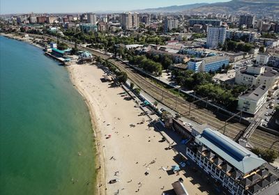 Makhachkala, city beach and stone jungle skyline