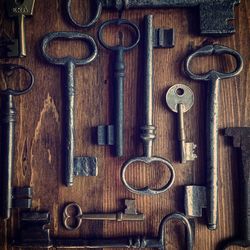 Close-up of old keys on table