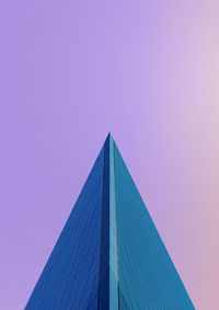 Low angle view of skyscraper against clear sky