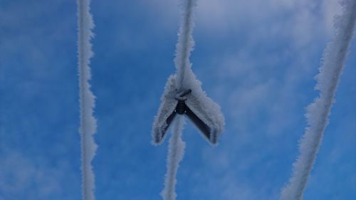 Low angle view of snow against sky