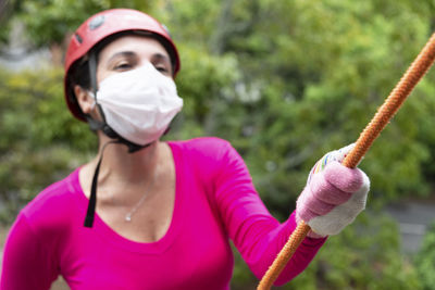 Female rappelist going down the rappel walkway. 