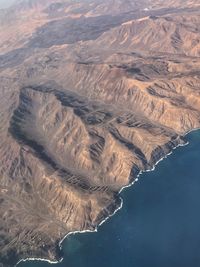 Aerial view of sea and mountains