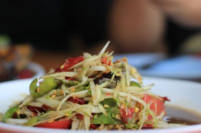 Close-up of chopped fruit salad in plate