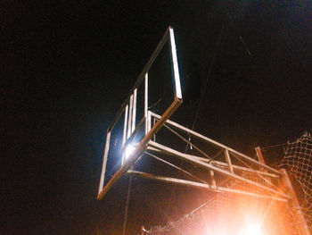 Low angle view of light trails at night