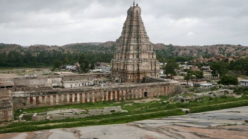 Ancient temple against building