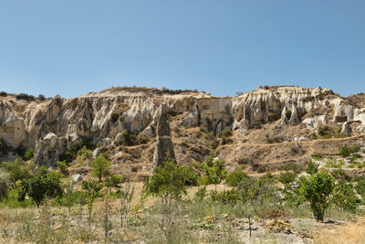 Rocky landscape against clear blue sky