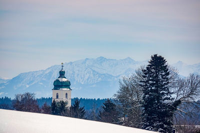 Scenic view of mountains against sky during winter