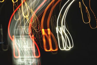 Close-up of light trails on black background