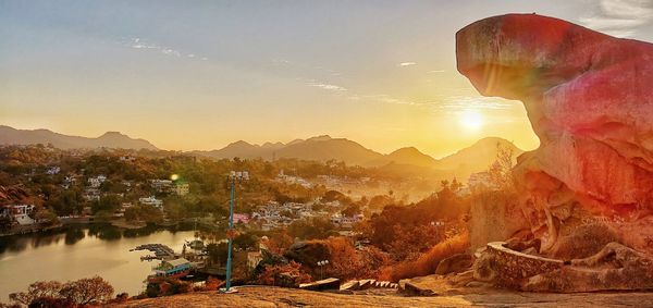 Scenic view of mountains against sky during sunset