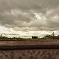 Scenic view of storm clouds over landscape