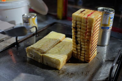 Roti bakar bandung, a sweet bread snack with a variety of jams, peanuts, chocolate, and cheese.