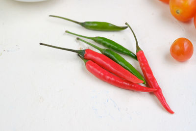 High angle view of chili peppers on table