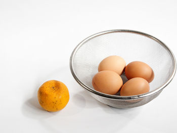 High angle view of eggs in container